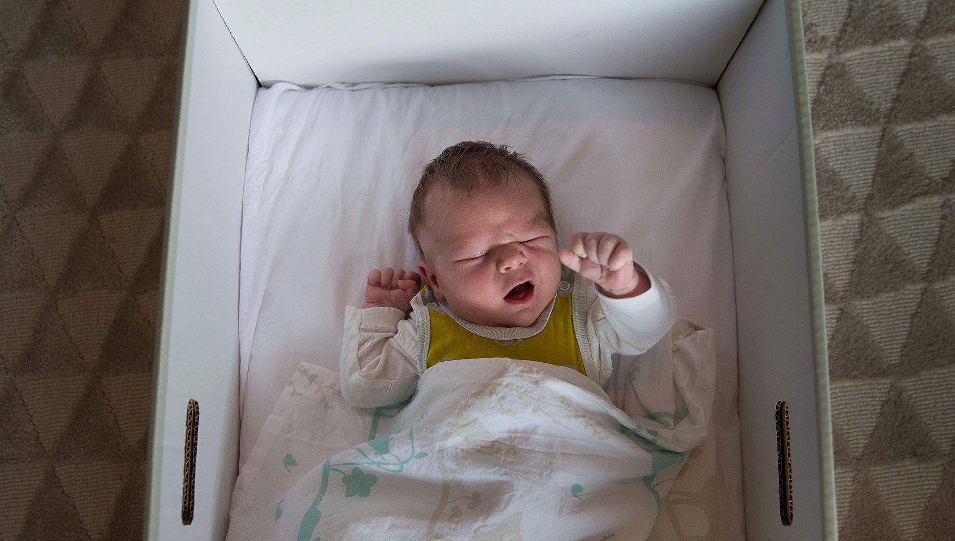 Finns start life safe and sound with a baby box from the government | Psyche